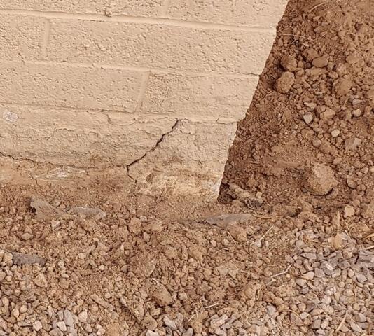 Stem Wall Failure Symptoms: Vertical Concrete Cracks