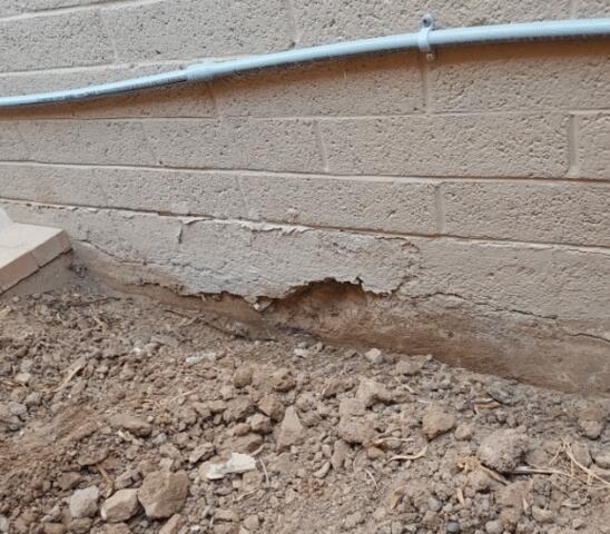 Stem Wall Failure Symptoms: Spalling Concrete