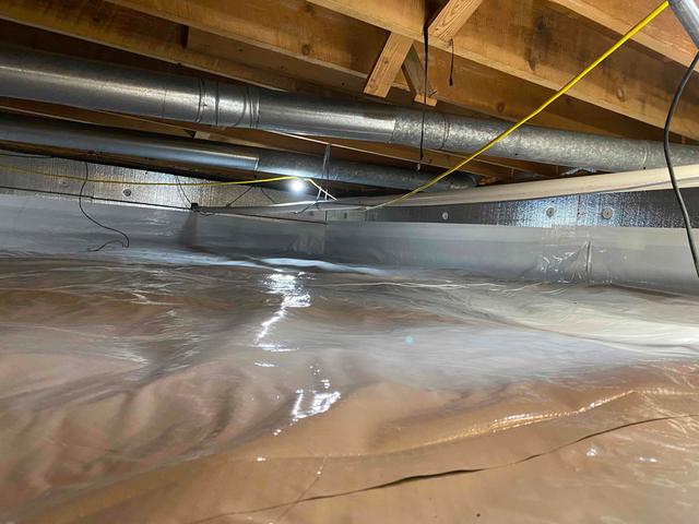 We installed CleanSpace vapor barrier to the seal the crawl space ground and walls, as well as SilverGlo thermal insulation on th block walls