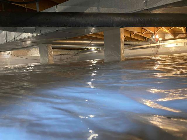 Our CleanSpace vapor barrier prevents moisture from passing through the crawl space ground and walls