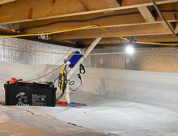 The SuperSump pump system will remove any water seeping into the crawl space out and away from the home