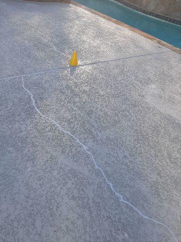 Cracked concrete around pool