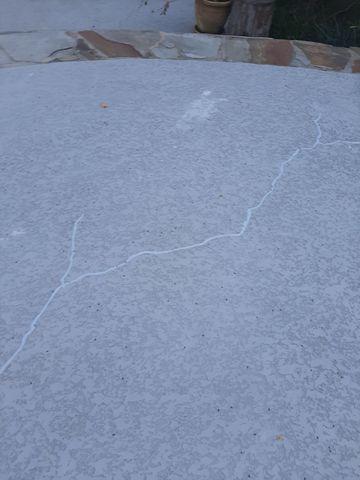 Cracked concrete around pool