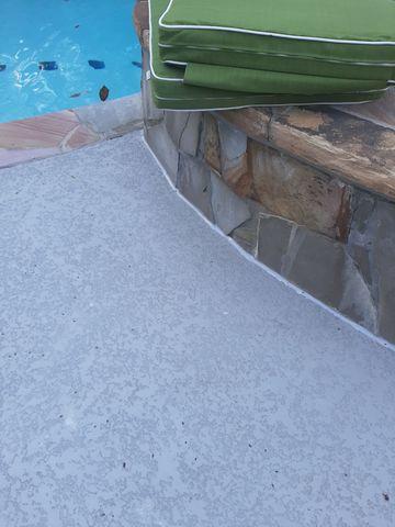 Cracked concrete around pool