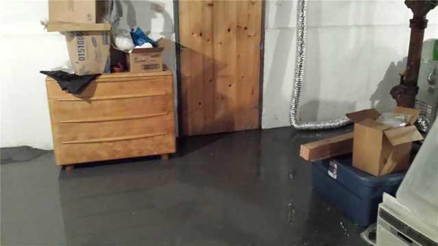 One way that water can flow into your home is through a hatch or other basement entranceway. To stop water from entering the basement, we could install a TrenchDrain. The TrenchDrain would catch water at the edge of the door before it seeped into your home, and then redirect it to a sump pump system to be pumped out of the house.