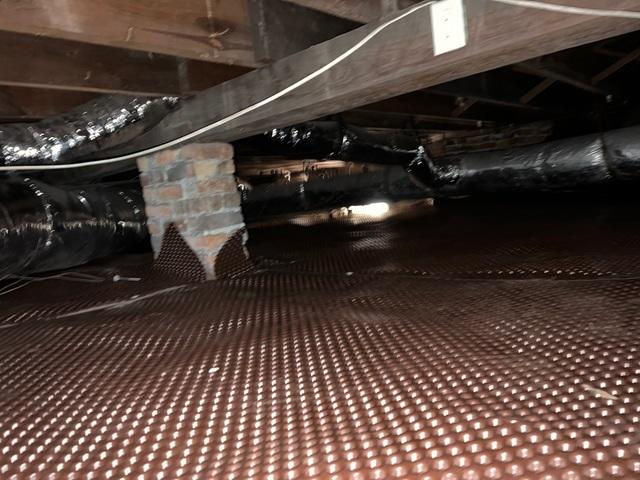 Debris Removed and Drainage Matting Installed