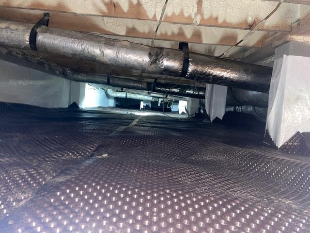 The first layer of the CleanSpace Encapsulation is the drainage matting layer that helps water to flow under the vapor barrier, allowing it to drain properly.