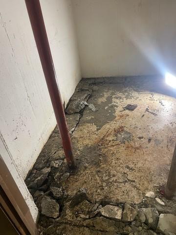 Removing Concrete For the Drain