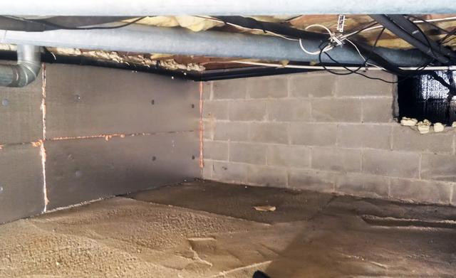 The foundational wall is insulated with our SilverGlo insulation panels and the interior wall does not need to be insulated.  Looking at the interior walls opening we can see our team insulated the foundational walls behind the interior wall.