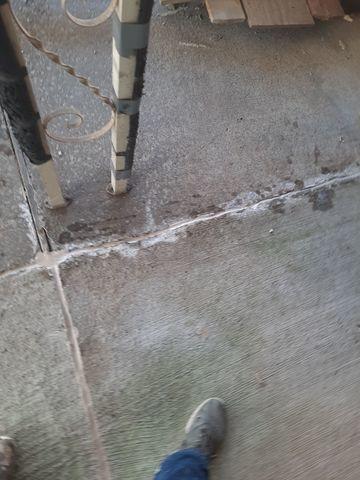 Cracked concrete under carport