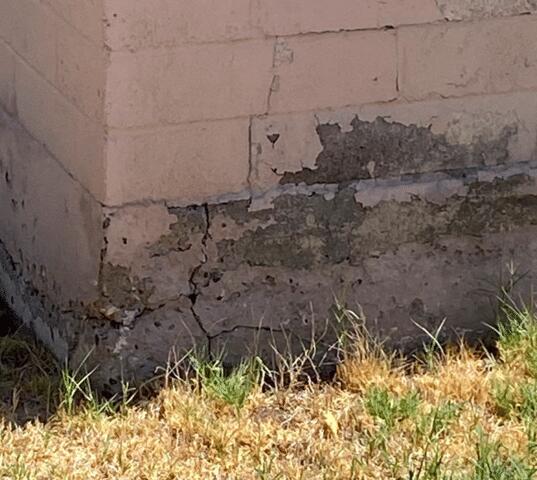 Symptoms of Oxidation in a Stem Wall: Spalling Concrete