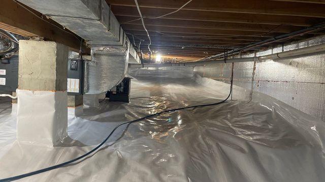 Insulated and air sealed walls keep the crawl space air and temperatures controlled.  The floors are covered and kept dry.