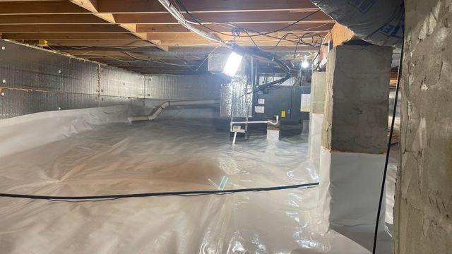 Insulated and air sealed walls keep the crawl space air and temperatures controlled.  The floors are covered and kept dry.