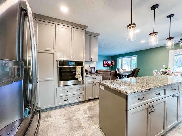 A nice built in microwave oven was built on this side of the kitchen as well along with large pantry cabinets.