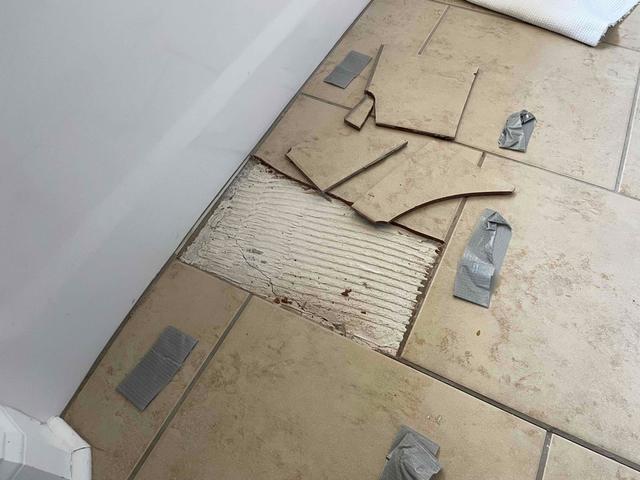 Cracking Tile in Master Bathroom