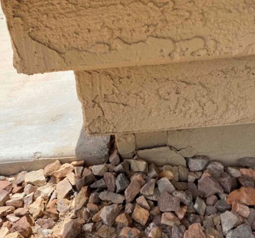 Signs of Failure in a Concrete Stem Wall: Spalling Concrete