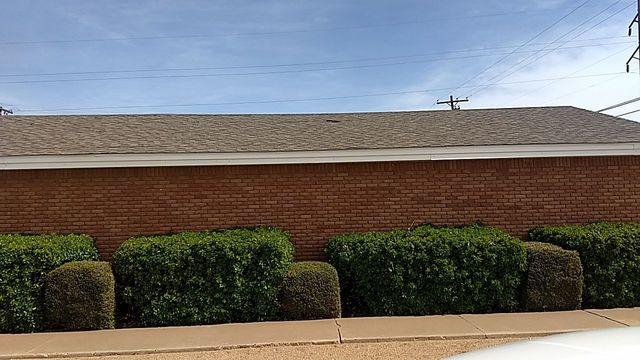 Repair side view of church roof