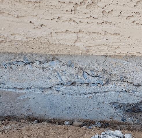 Symptoms of Corrosion in a Concrete Stem Wall: Horizontal Cracks