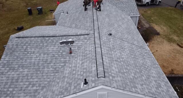 Our team finishing up this beautiful roof.