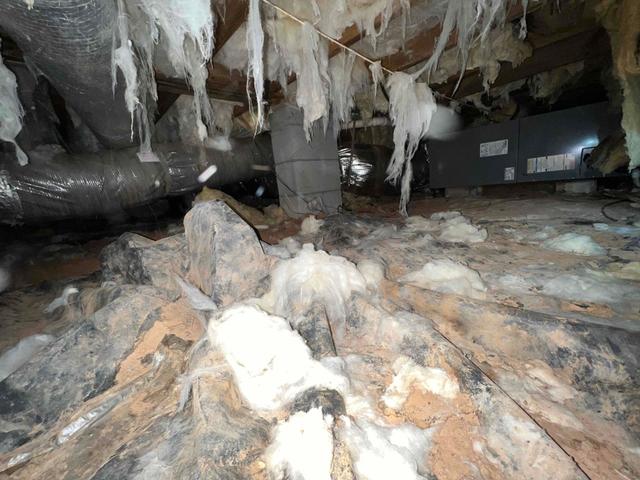 Falling Insulation in Messy Crawl Space