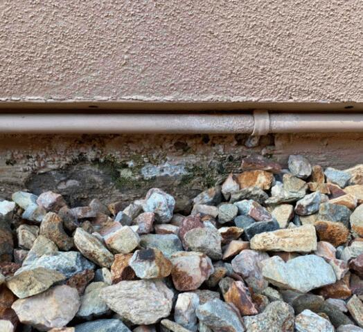 Symptoms of Corrosion in a Stem Wall: Spalling Concrete