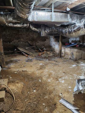 This is what the crawl space looked like when Danny went for his inspection. There was lots of water damage on the walls.