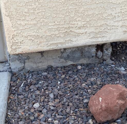 Flaking Paint in a Concrete Stem Wall