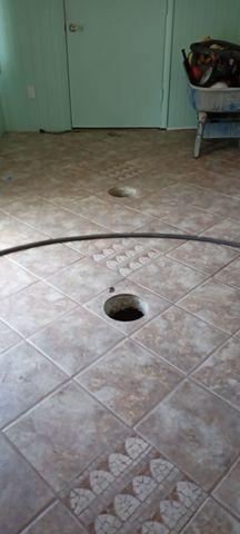 Holes Drilled in Flooring