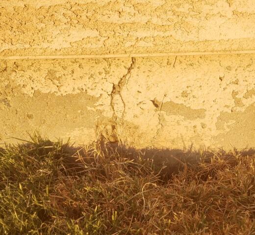 Signs of Corrosion in a Concrete Stem Wall: Vertical Cracks