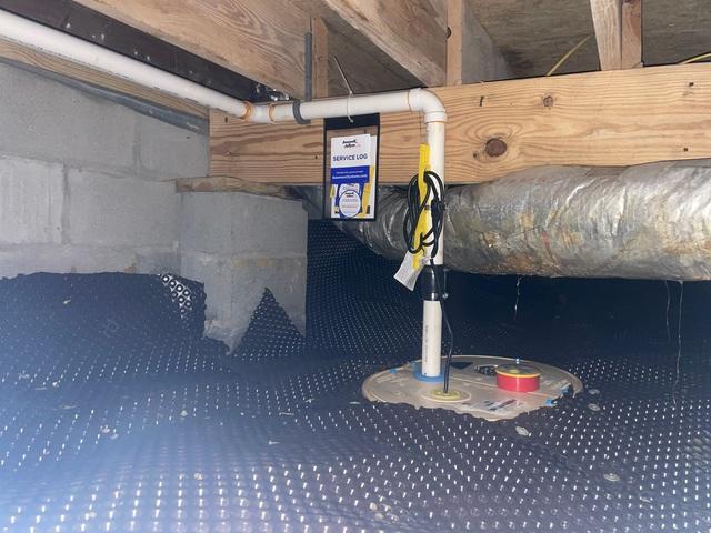 Fully Installed Sump Pump with Drainage Matting
