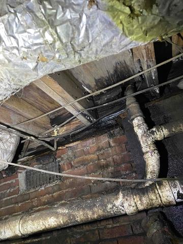 Plumbing Leak Damage: Crawl Space View