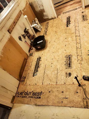 New Treated Wood Floor Installation
