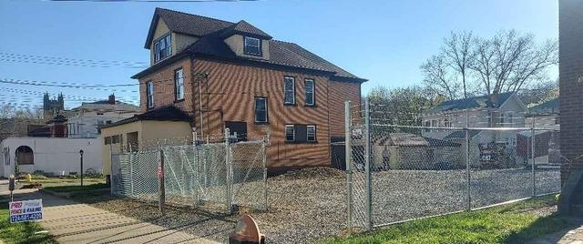6' High with Barb Wire attached to top Galvanized Chain Link Fence/ (1) 14' cantilever gate