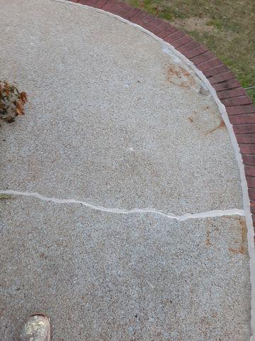 Cracked and separated concrete that has been repaired