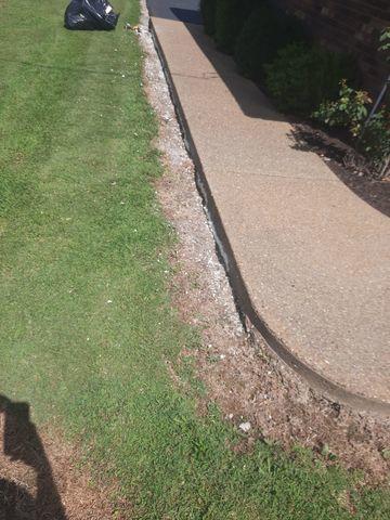 sidewalk erosion after the injection of Poly Level and trim.