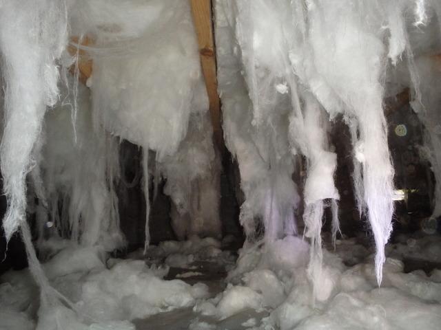 <p>An up close look at insulation sagging away from the subfloor. This allows air to pass through it, causing high humidity within the crawl space. &nbsp;</p>