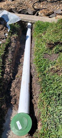 Pipe Secured to Relief Drain