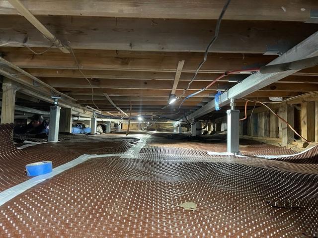 Drainage Matting and SmartJack Crawl Space Support System Installed