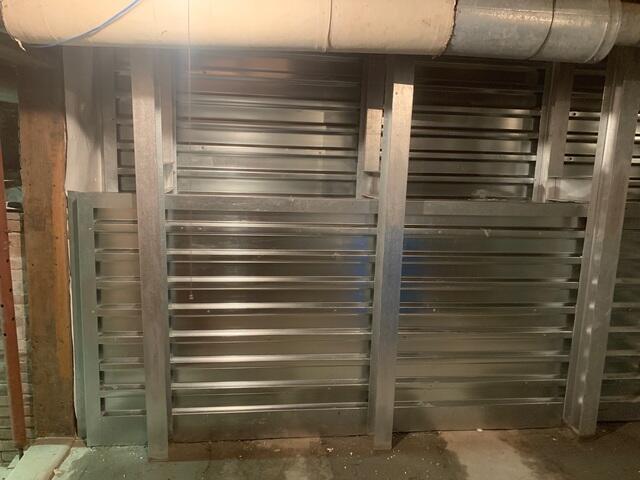 This is the EverBrace system that acts as a replacement for crumbling foundation walls.