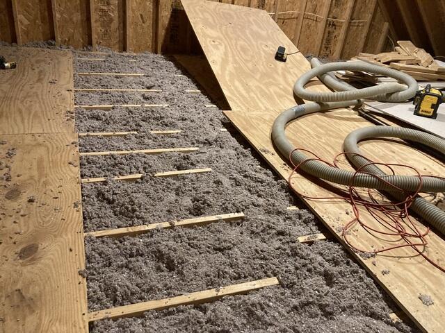 Insulating under storage decking