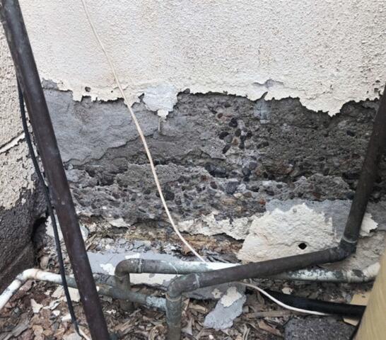 Signs of Corrosion in a stem wall: Flaking Paint