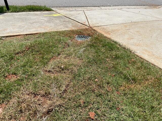 Gutter Shutter of Greater Atlanta Discharges Underground Downspout in Cumming GA