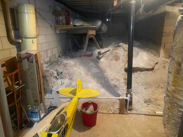 Before Encapsulation: Crawl Space Entrance