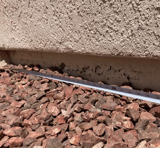 Symptoms of Corrosion in a Stem Wall: Flaking Paint in Tucson, AZ