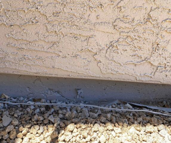 Signs of Corrosion in a Stem Wall: Flaking Paint in Phoenix, AZ