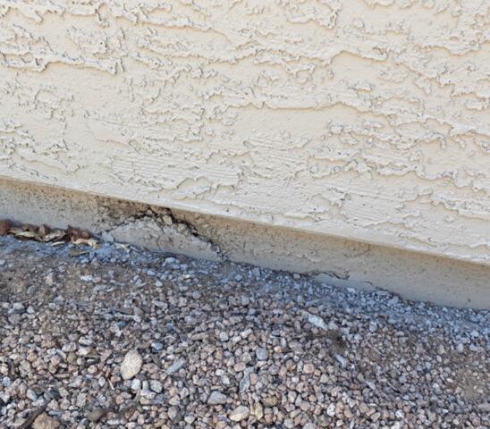 Signs of Corrosion in a Stem Wall: Spalling Concrete in Phoenix, AZ