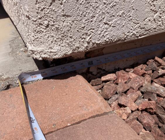Signs of Corrosion in a Stem Wall: Flaking Paint in Tucson, AZ