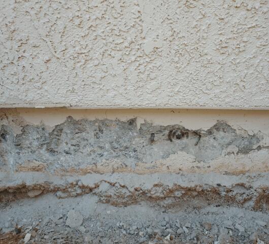 Signs of Corrosion in a Stem Wall: Spalling Concrete in Tucson, AZ