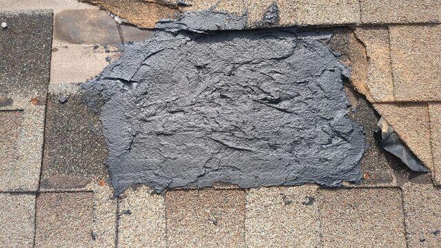 Underlayment is fully exposed due to shingles missing.