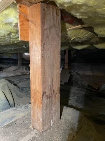 Water staining on post in crawlspace